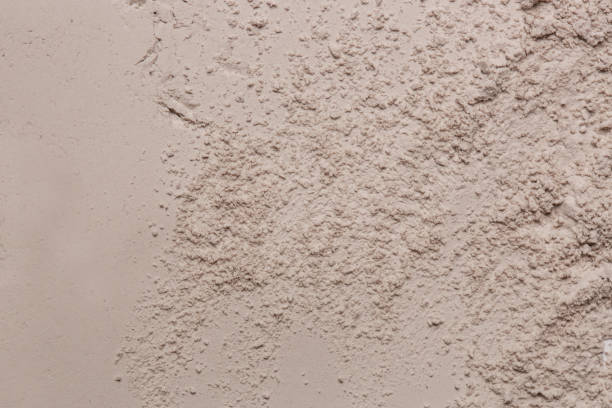 istock Cosmetic clay powder textured background, close up 1150779824