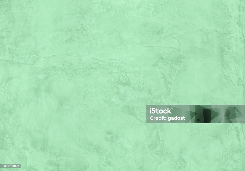 Neo mint concrete textured background Trendy Neo mint colored low contrast Rough Concrete textured background to your concept or product. Color of the year 2020 2020 Stock Photo