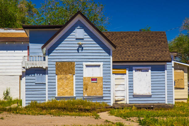 istock Abandoned House With Boarded Up Windows 1150782805