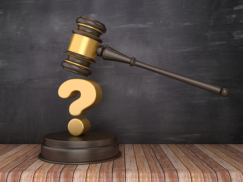 Gavel with Question Mark on Chalkboard Background - 3D Rendering