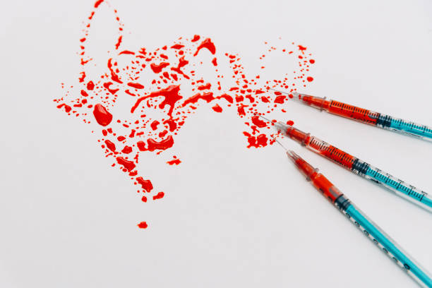 istock Treatment against addiction. Syringe with blood. Immunodeficiency. 1150783244