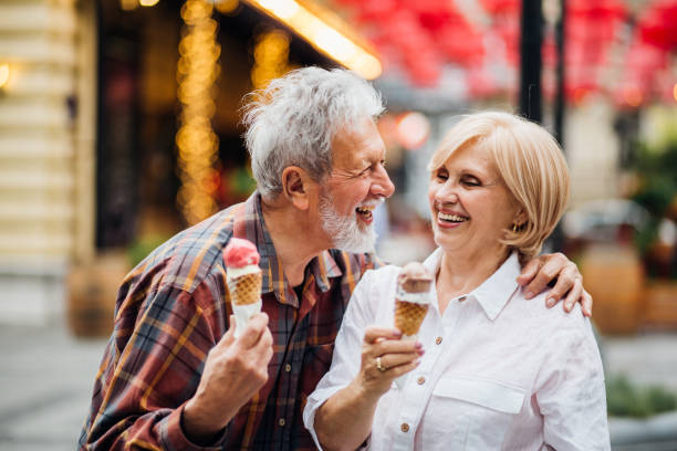 istock Couple sharing a laugh when eating ice cream 1150785385