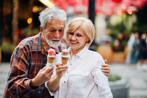 istock Old couple having ice-cream 1150785458