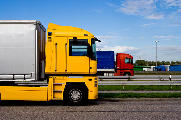 istock Yellow truck next to highway 115078609