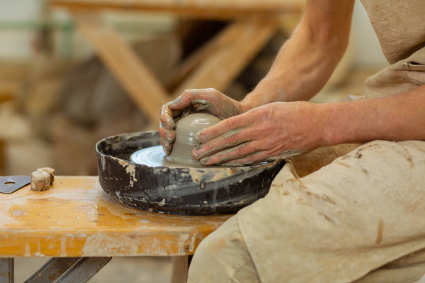 istock Practiced hard-working guy being an expert in pottery mastery 1150786219