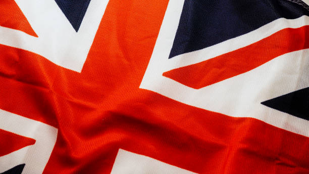 istock United Kingdom, british UK flag background 1150787801