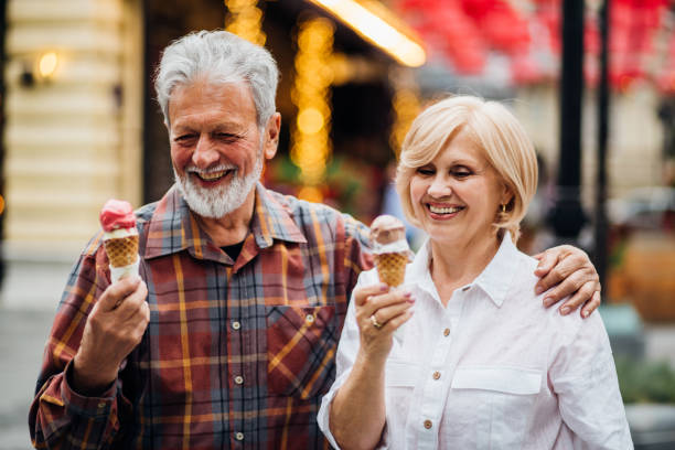 istock Smiling couple having ice-cream 1150789088