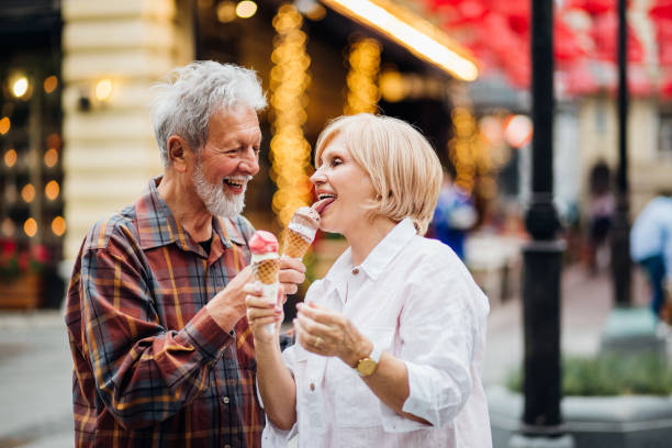 istock Couple having ice-cream and smiling 1150789463