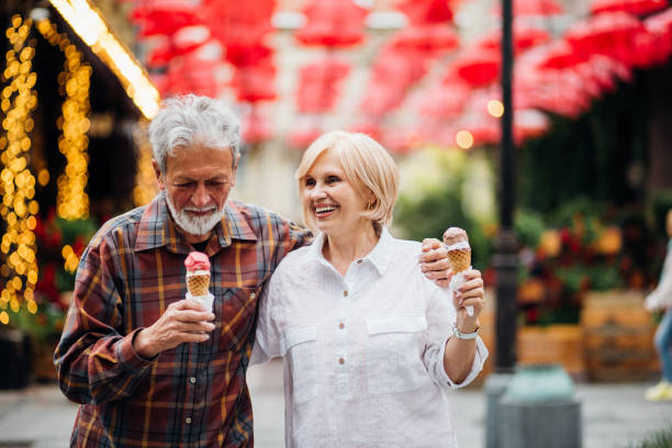 istock Mature couple eating ice-cream 1150789464