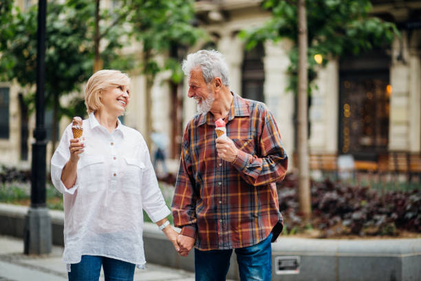istock Elderly couple eating ice-cream 1150791288