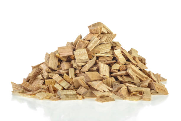 istock Pile of wood smoking chips isolated on white background 1150792156