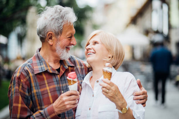 istock Couple eating ice-cream cone 1150794612