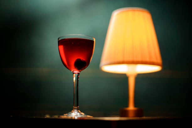 istock Close shot of alcohol drink with cherry inside 1150796101