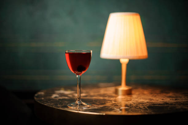 istock Close-up of an alcohol drink with cherry inside 1150796231