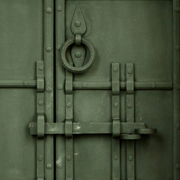 istock Forged antique metall door 1150796359