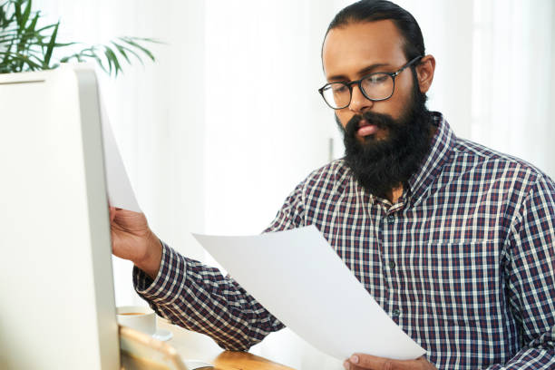 istock Businessman reading a contract 1150796388