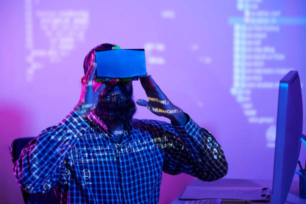istock Man in virtual reality glasses working at office 1150796394