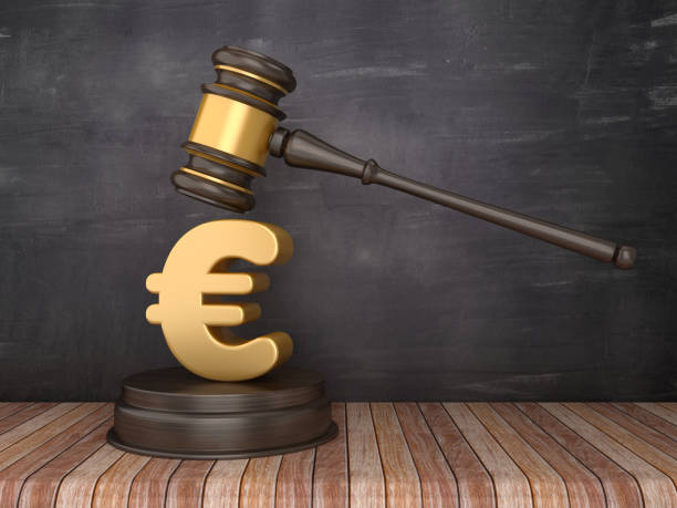 istock Gavel with Euro Sign on Chalkboard Background - 3D Rendering 1150797373
