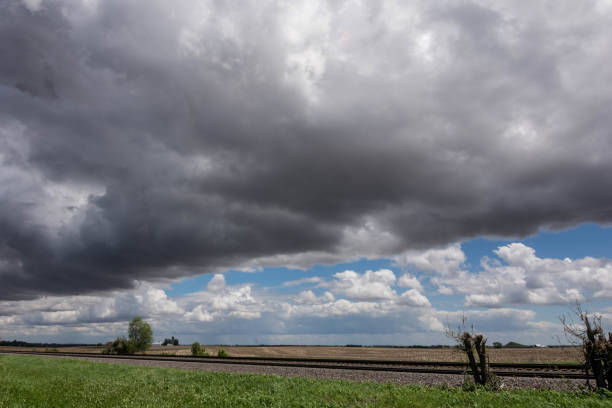 istock Storm clouds building in rural north central Illinois on a warm spring day. 1150797531