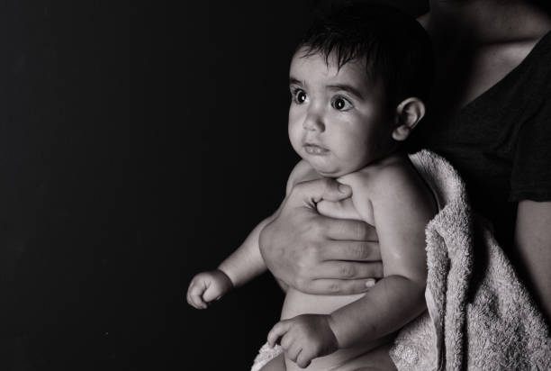 toddler girl making big eyes