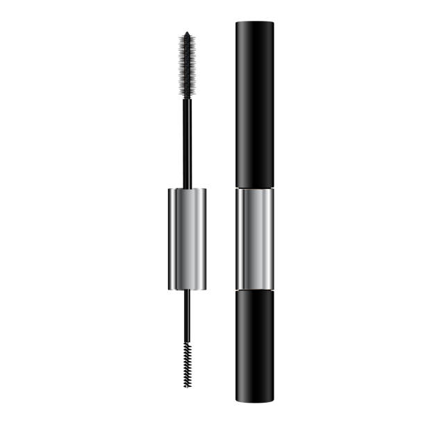 istock A mascara tube and   wand applicator. Cosmetic bottle with eyelash brush. Isolated on white background. Grunge swatch, black wavy brush stroke hand drawn. 3d realistic 1150803485