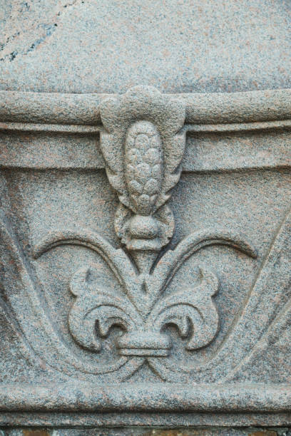 istock Stone Flower. Stone carving 1150804658