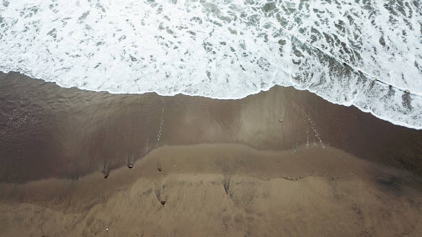 istock Drone aerial view sea waves. Blue water background 1150805381