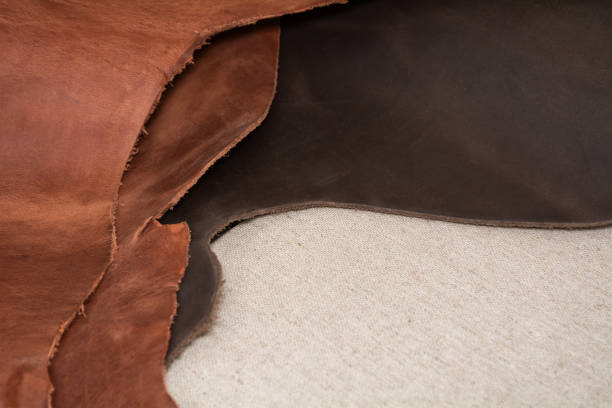 istock Texture of pieces brown leather. Natural material background. 1150806207