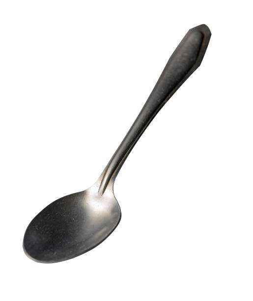 istock spoon isolated on white background. metal spoon. vintage spoon. 1150808152