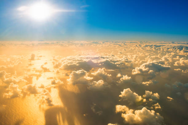 Empty cloudy sky with shinning sun
