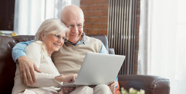 istock Senior couple browsing the internet together 1150816938