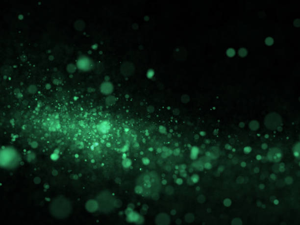 istock Abstract particle bokeh with  green background 1150818441