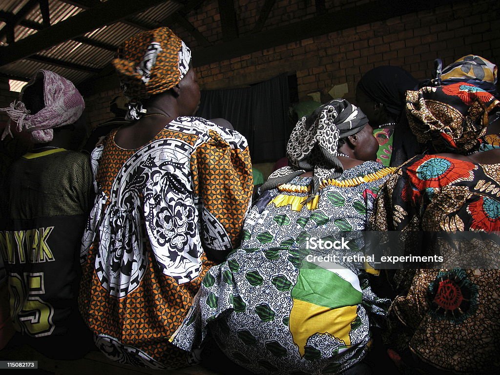 africa . women sitting women sitting on a bench in an African Village Church Chad - Central Africa Stock Photo