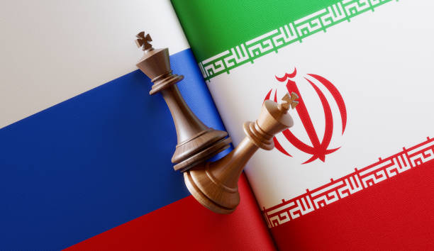 istock Russian and Iranian Flag Pair with King Chess Pieces 1150822311