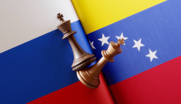 istock Russian and Venezuelan Flag Pair with King Chess Pieces 1150828141