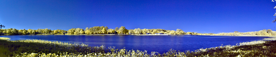 An infrared panoramic view across the wicomico river in salisbury, maryland from the pemberton historical park on a clear spring morning