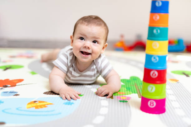 istock Baby boy having fun at home 1150829105