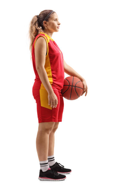 istock Female basketball player standing with a ball 1150831439