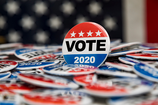 High quality stock studio photography of Vote 2020 presidential election buttons
