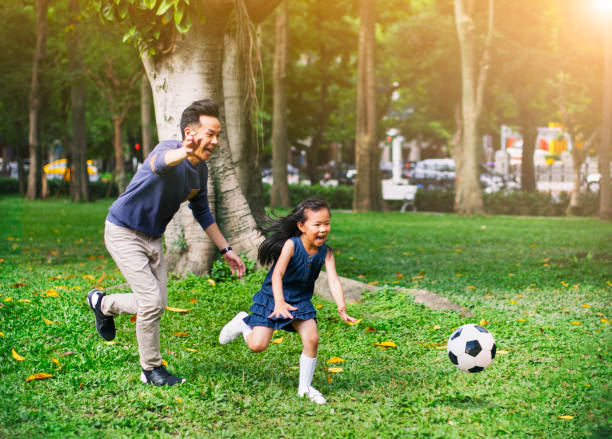 istock Playing Soccer with dad Taipei 1150833092