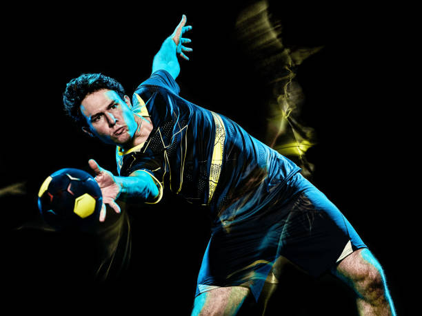 istock handball player young man isolated speed light painting 1150834727