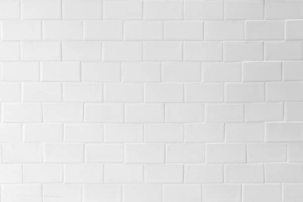 istock Porcelain tile texture patterned wall background white cream beige grey color 1150834896