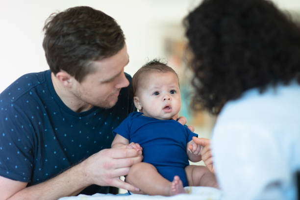 istock Doctor gives baby a checkup 1150835005