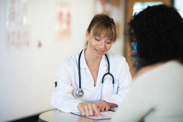 istock Doctor speaking to patient 1150835058
