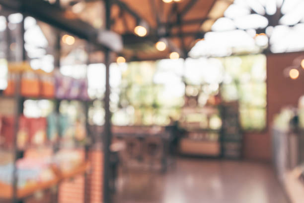 istock Cafe coffee shop interior abstract blur defocused with bokeh light background 1150836126