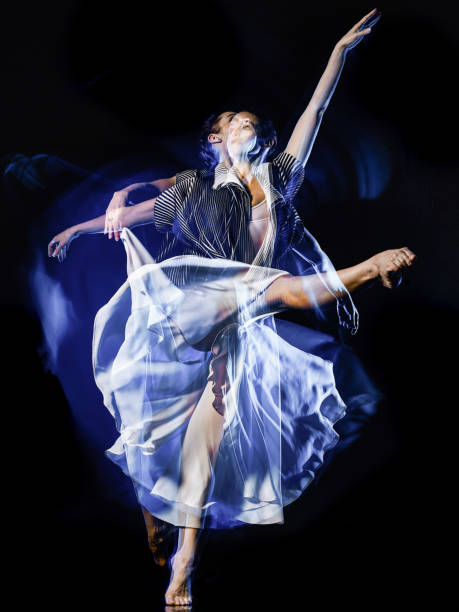 istock modern ballet dancer dancing woman isolated black bacground 1150837949