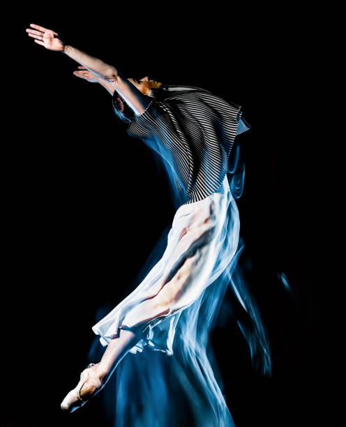 istock modern ballet dancer dancing woman isolated black bacground 1150838522