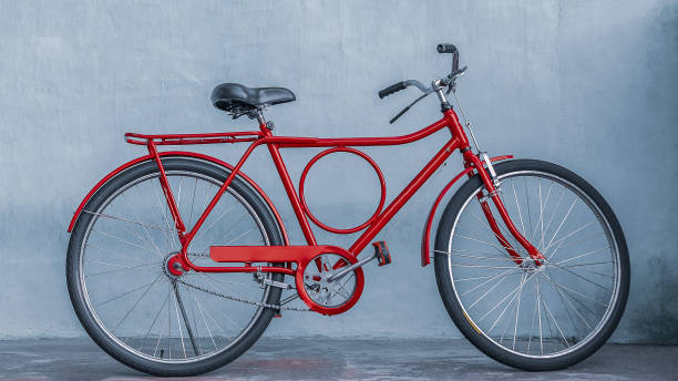 istock Red bicycle by near the wall 1150847476