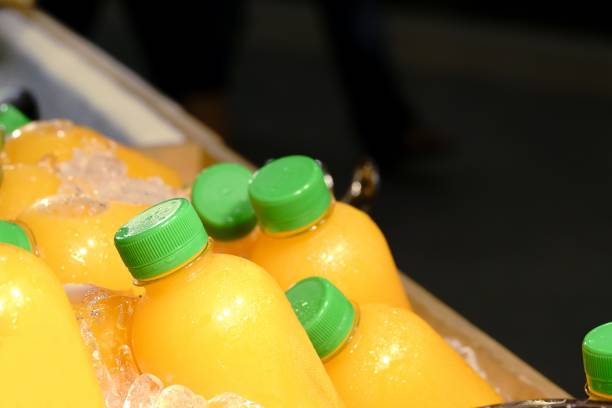 istock Homemade fruit juice in a plastic bottle on ice 1150852153
