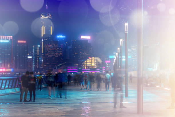 istock Abstract colorful bokeh with city night background. Double exposure 1150855292